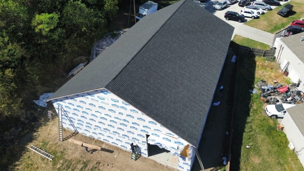 Building with new black roof | The Bearded Contractor